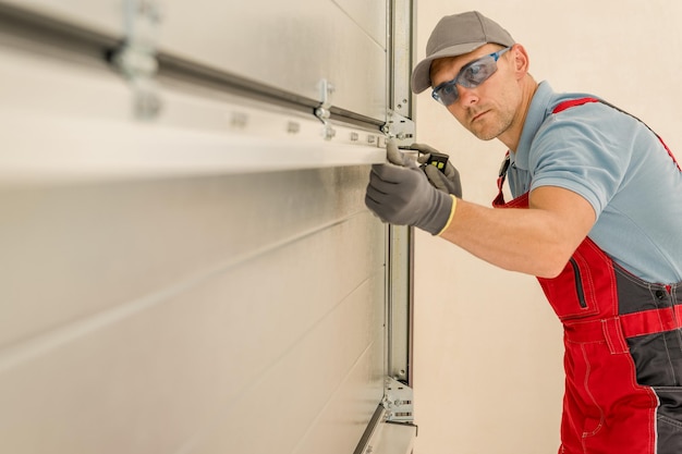 Installing Brand New Residential Garage Doors by Professional ...