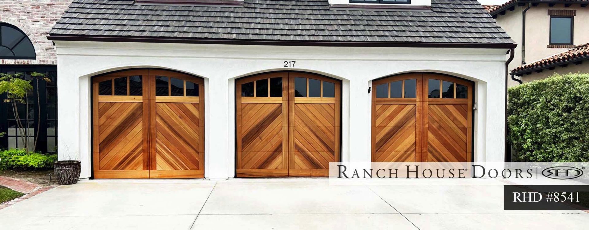Before and after home transformation standard vs carriage-style garage doors