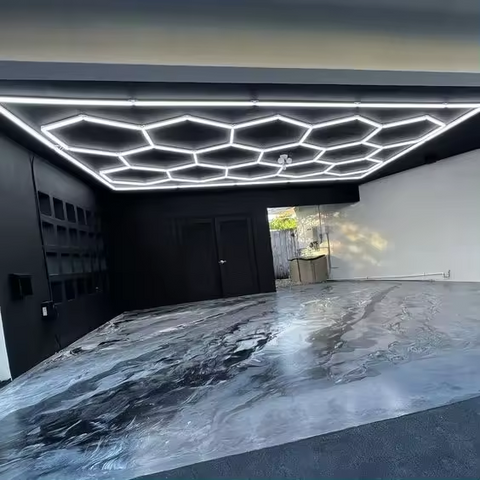 Modern high-tech garage with LED lighting and epoxy flooring