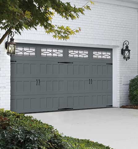 Steel Mission Style Garage Door with Decorative Hardware