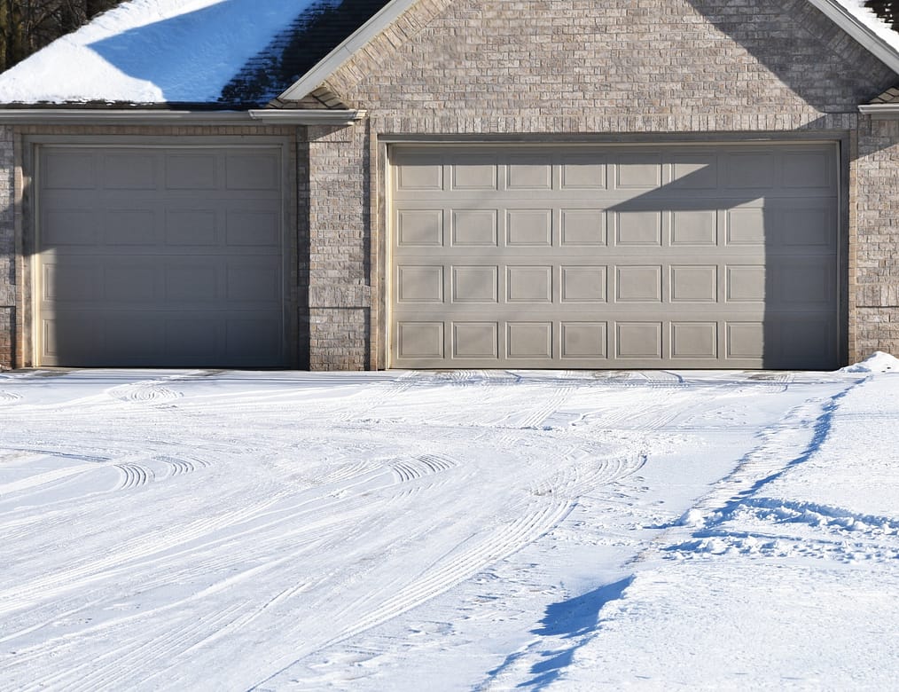 Family Installing Garage Door