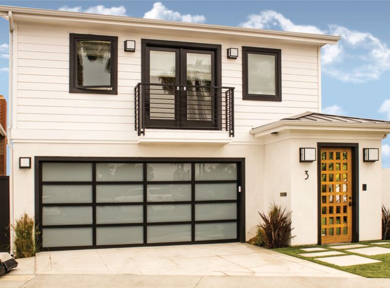 Generate a split image capturing a 'before and after' transformation of a garage featuring Wayne Dalton steel doors during winter