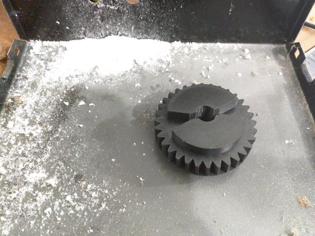 3d printed garage door opener drive gear next to the gear it is ...