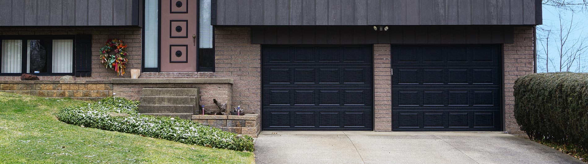 black garage doors brick stucco metal architecture styles photo