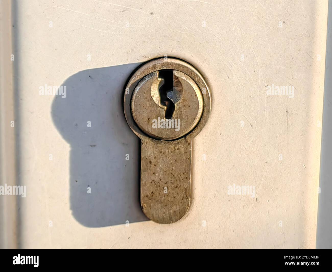 close-up of a garage door lock button