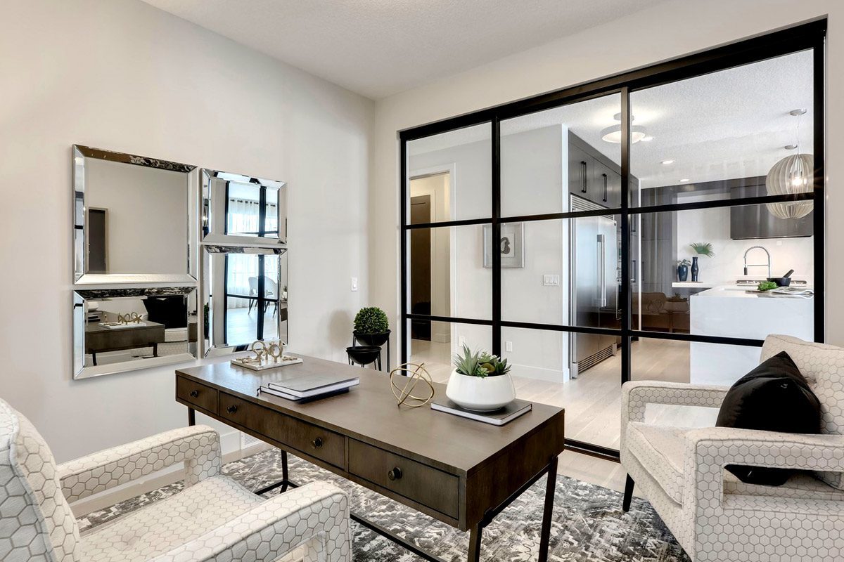 Stylistic showroom interior featuring a side-by-side comparison of two doors: on the left, a custom-crafted door showcasing intricate carvings, rich mahogany wood with a deep, polished finish, ornate brass handle, and elegant stained glass top panel. On the right, a mass-produced door, simple in design, made of plain white composite material, with a basic silver handle and no decorative elements. Soft ambient lighting highlights the contrast, with a sleek modern backdrop of minimalist furniture and neutral tones, emphasizing elegance and craftsmanship versus simplicity and function.