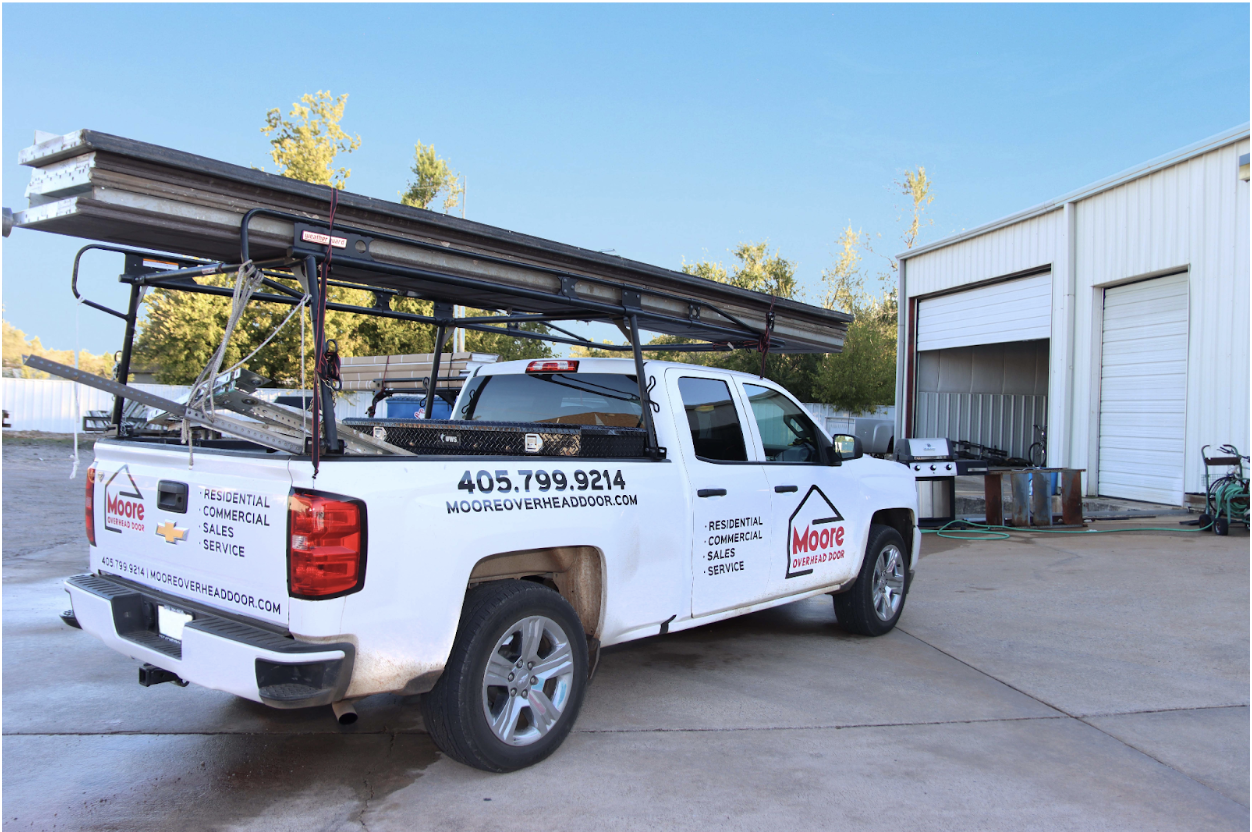 Garage door technician truck service preparation photo