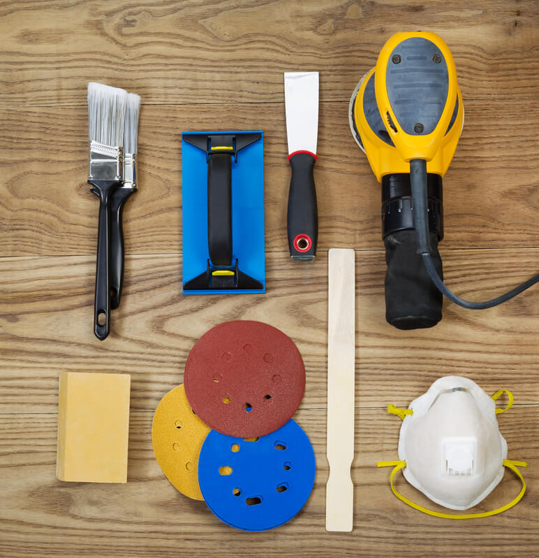 Wooden garage door maintenance tools and products