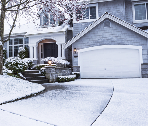 Frozen Landscape Home Insulated Steel Garage Door