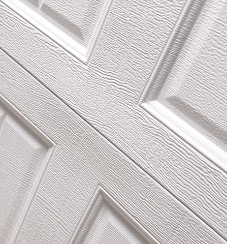 Family Preparing to Install Stamped Garage Door
