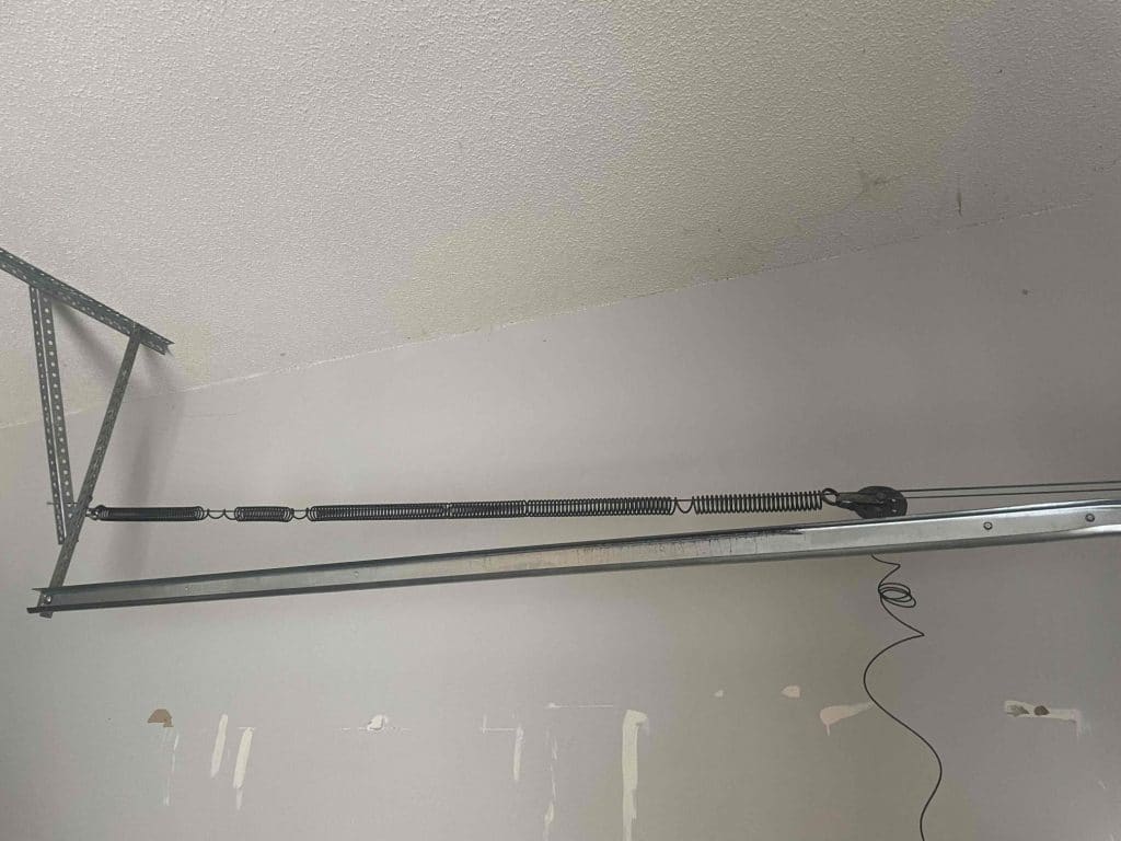 Broken Garage Door Extension Spring Before Glaze 1024x768
